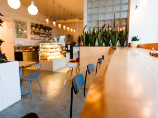 Table and row of chairs in empty cafe SSUCv3H4sIAAAAAAAEAH1SsW7CMBDdK/UfIs+kxA4hpGOHSpU6dEcMF/sAi8RGtkNVofx77SSAQVWXyPfevXd5Pp+fn5KE1GAlJ6/JOVS+lk3TWWfASa08nM0mHIV02khoAhiwfmCIdeA6izZYTBAHhzvfO4KT/jJnPdbJhRhIr/AUeeusVGjt/F0qUBzJLOqxXR16vlAfGyQXop/96ycbIdXOzj9BiRbMwf5l+aGE1uZmOR42l+SwQ8V/blGCcN85h8Y6zQ9xJk8t7yYwerXdXHGy1U43Eh6UNMsq9kIzWtDhy/6SCoPQWidbfFSz8m7yorjJx0Mfbc1ggzBubT26k8O3T9TGezxJgTqqoRNSRys9aQ5NEOSR89FI7q88kmm3RxM/D/++dBsBSrvhT8gYgAj/fkJJcx9qkeV5waqMstUqmxqkCDRCvV3VS57SEkW64IVIYVsv05yJqippzooyXGH/C/x4JS/oAgAA